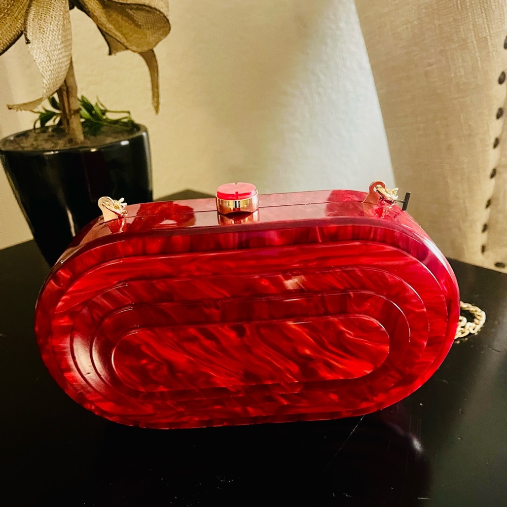 Vibrant Red Clutch with Metallic Accents